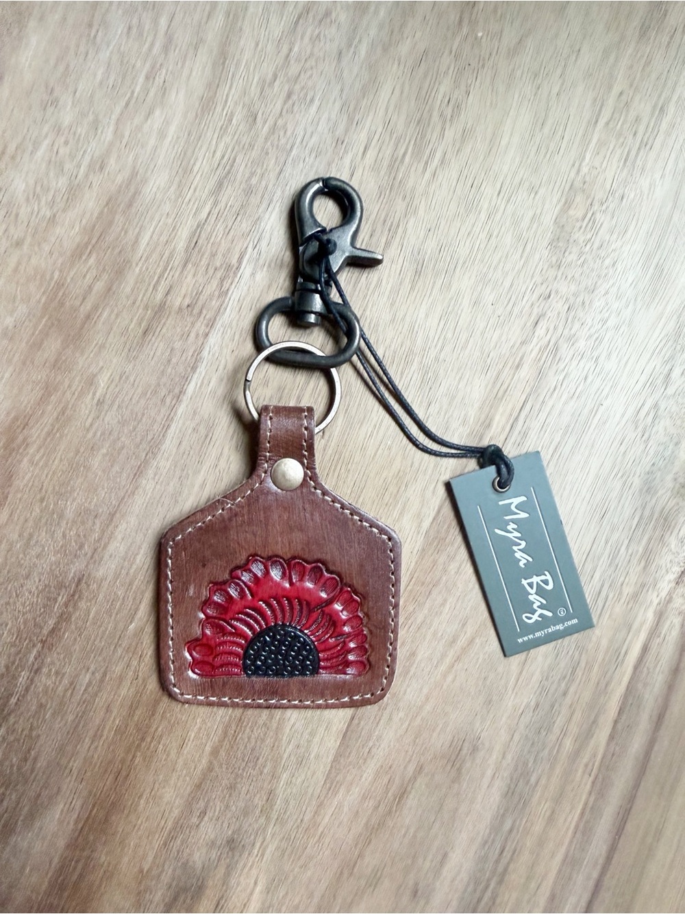 Myra Bag Brown Leather Keychain with Red Flower Accent